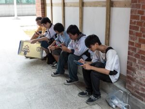 School Kids On Smartphones